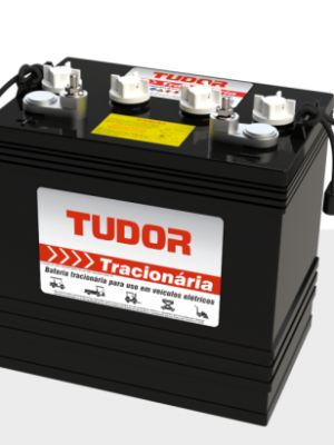 Automotive 12V battery with Tudor branding and top terminals on a light surface.